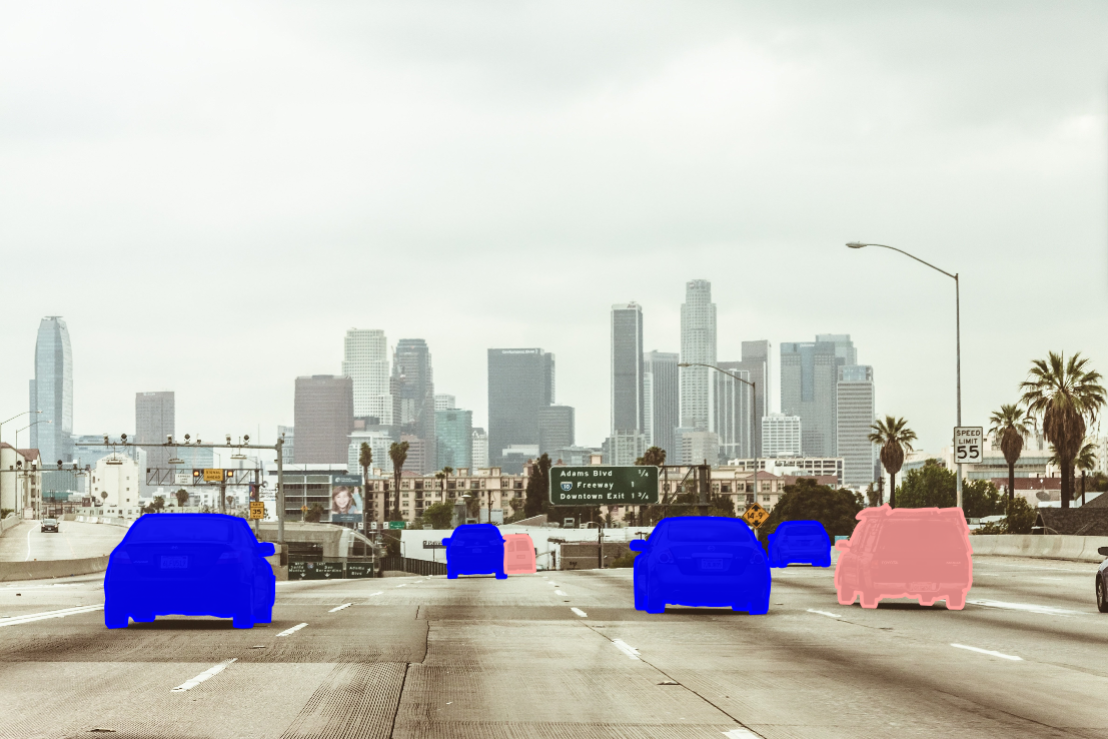Same road scene with six selected vehicles covered by separate polygon annotations